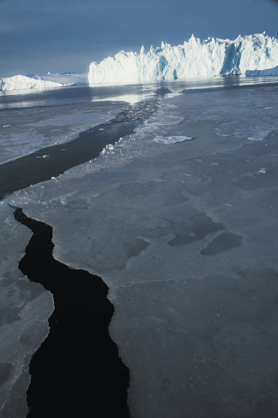 Greenland, photographed from a boat navigating the melt where dog sleds used to travel across the ice, October 2009