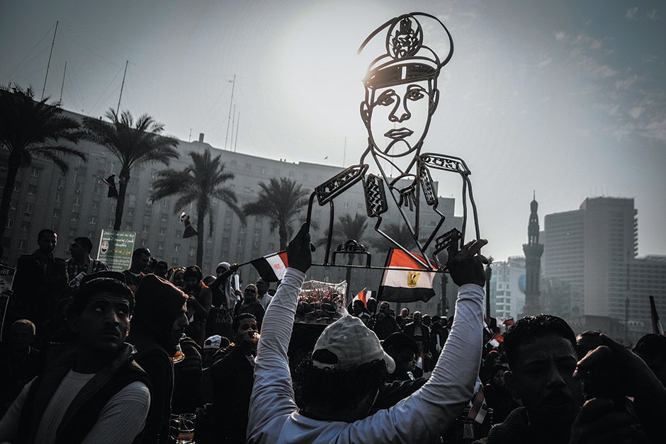 Demonstrators with a portrait of General Abdel Fatah el-Sisi—now Egypt’s president—at a rally in Tahrir Square, Cairo, January 2014