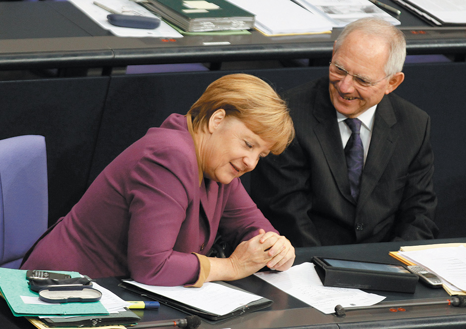German Chancellor Angela Merkel and Finance Minister Wolfgang Schäuble before a vote on financial help for Greece, Bundestag, Berlin, November 2012