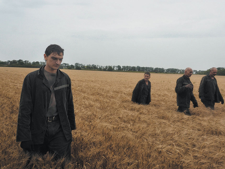 Rescuers searching for bodies at the crash site of flight MH17, eastern Ukraine, July 18, 2014