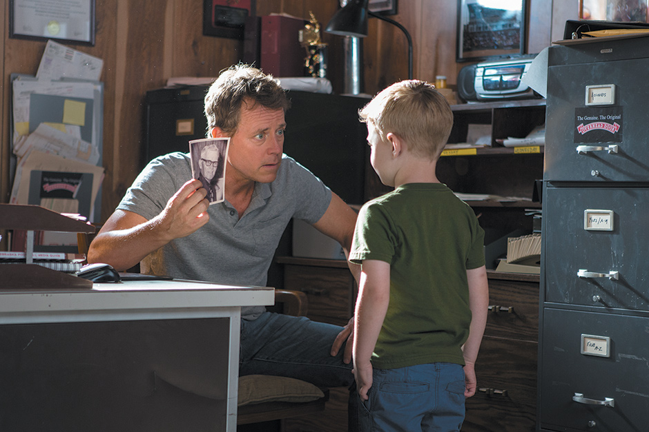 Greg Kinnear as Todd Burpo and Connor Corum as his son Colton in Heaven Is for Real, the film adaptation of Burpo’s memoir about his son’s near-death experience