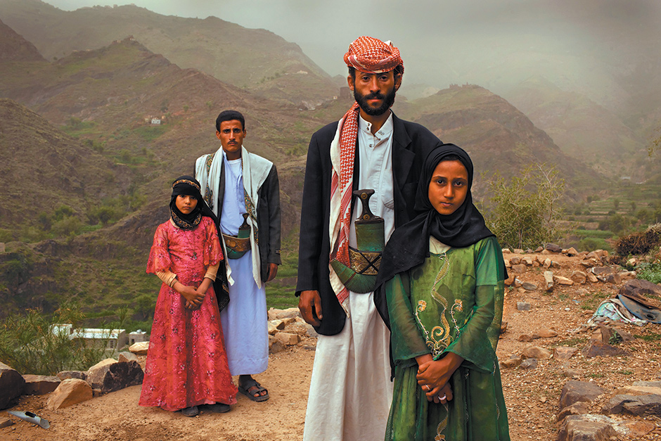 Two eight-year-old brides with their husbands, Hajjah, Yemen, July 2010