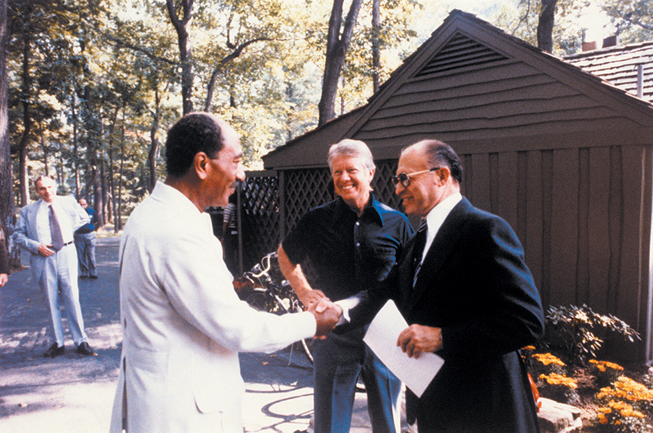Egyptian President Anwar Sadat, President Jimmy Carter, and Israeli Prime Minister Menachem Begin at Camp David, Maryland, at the start of the talks that led to the Camp David Accords, September 1978