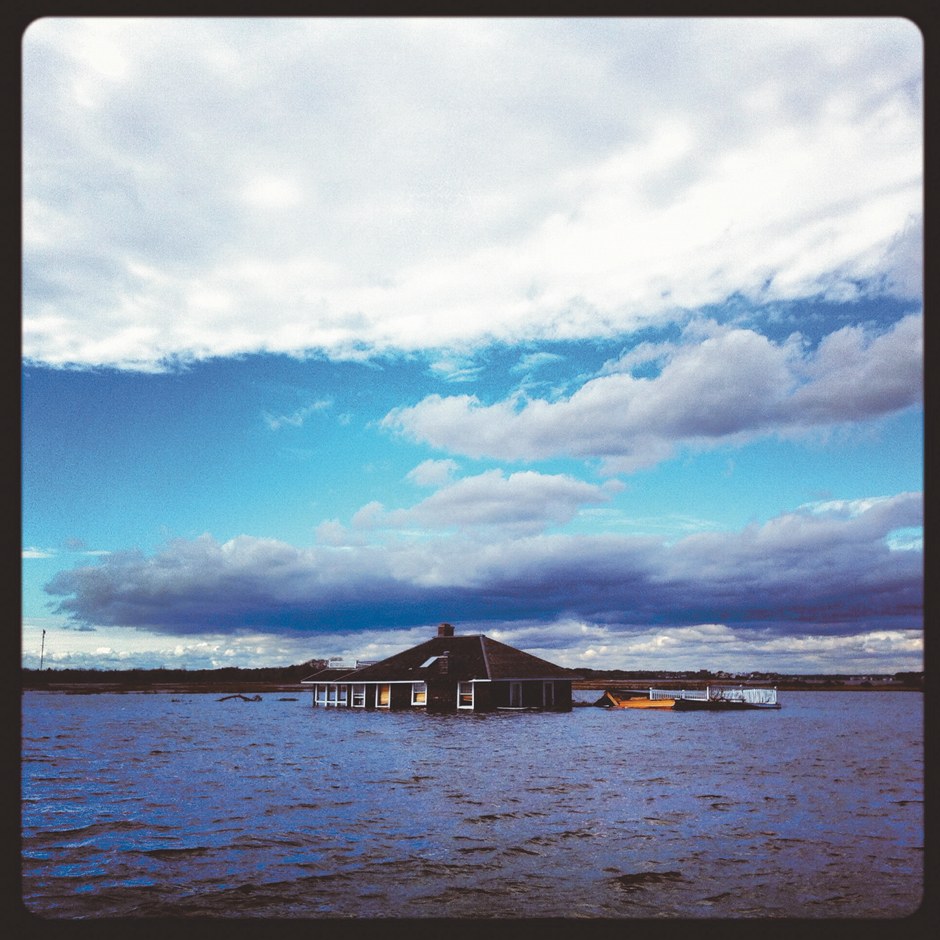A house swept into a lake by the storm surge of Hurricane Sandy, Mantoloking, New Jersey, October 2012; photograph by Andrew Quilty from the collection #Sandy: Seen Through the iPhones of Acclaimed Photographers