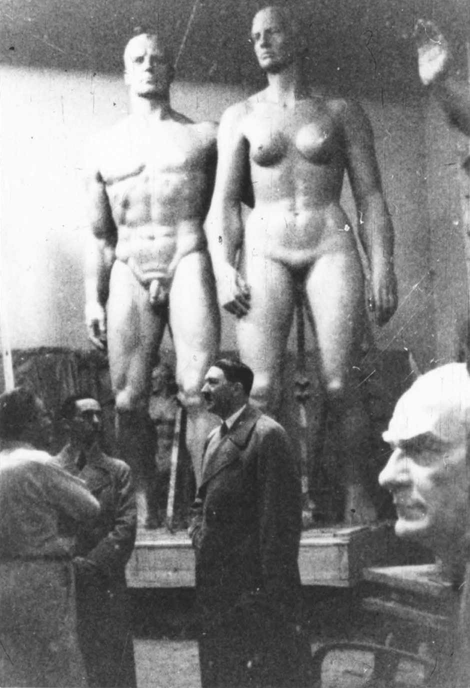 Adolf Hitler in the workshop of the sculptor Josef Thorak, with Thorak’s bust of Atatürk behind him, Munich, February 1937