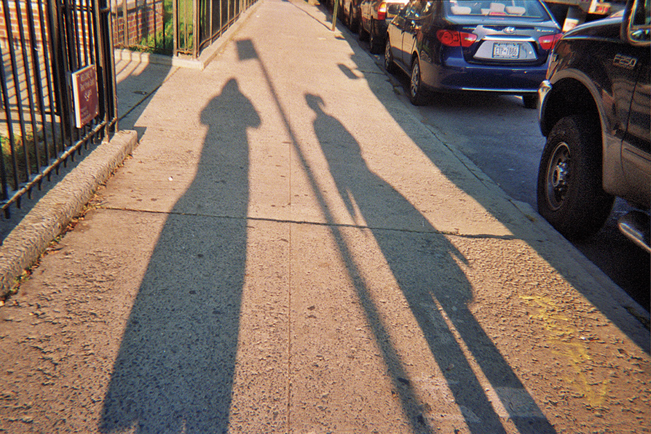 Shadows of residents of a housing project in Red Hook, Brooklyn, 2011; photograph by Jared Wellington, a twelve-year-old workshop participant, from Project Lives: New York Public Housing Residents Photograph Their World. Edited by George Carrano, Chelsea Davis, and Jonathan Fisher, it has just been published by PowerHouse Books.