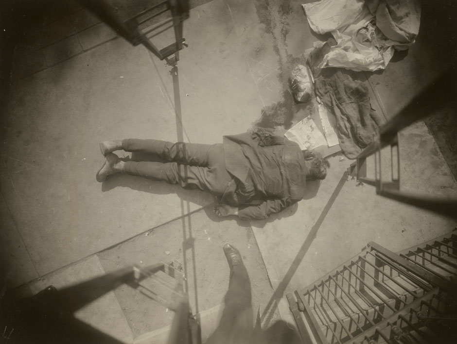 A dead body in front of a church on 86th Street, Queens, May 13, 1926