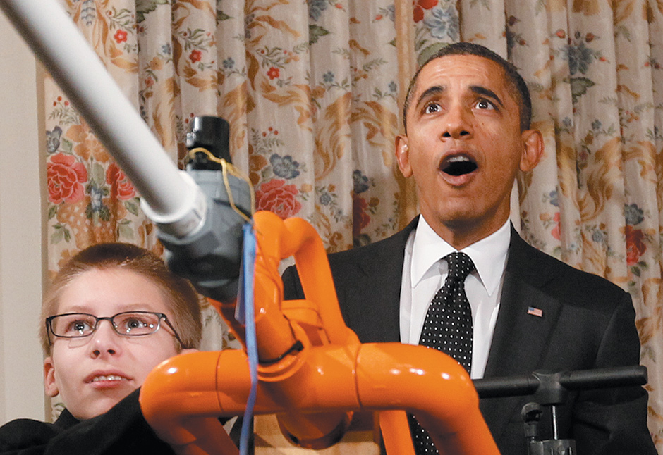 President Obama with teenage inventor Joe Hudy of Arizona during a demonstration of Hudy’s Extreme Marshmallow Cannon at the White House Science Fair, February 2012