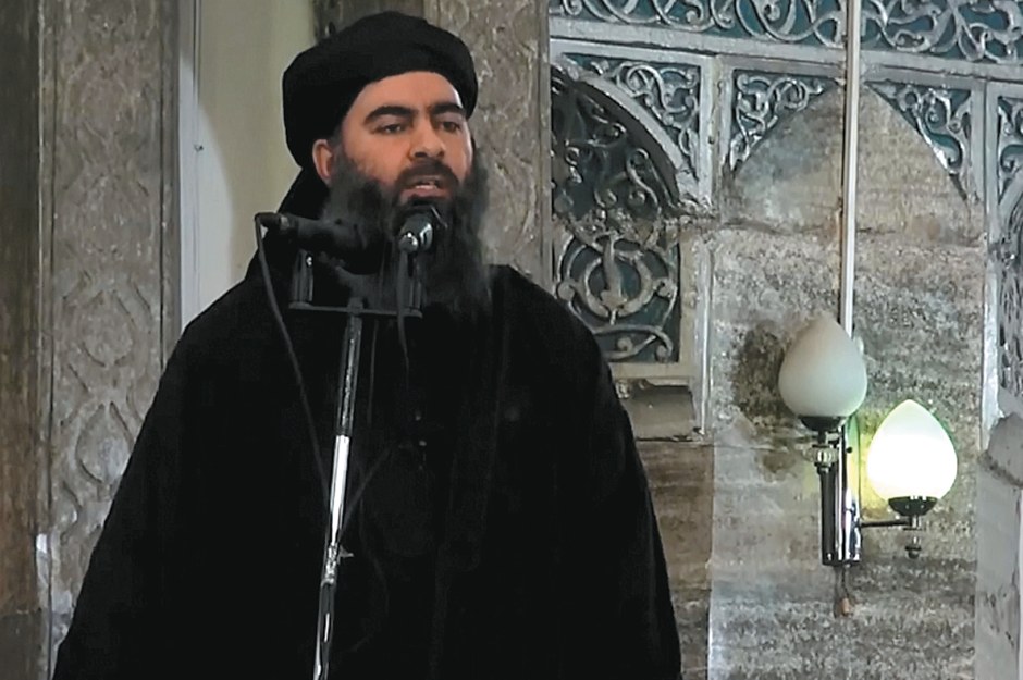ISIS leader Abu Bakr al-Baghdadi preaching in a mosque in Mosul, from a video released in July 2014