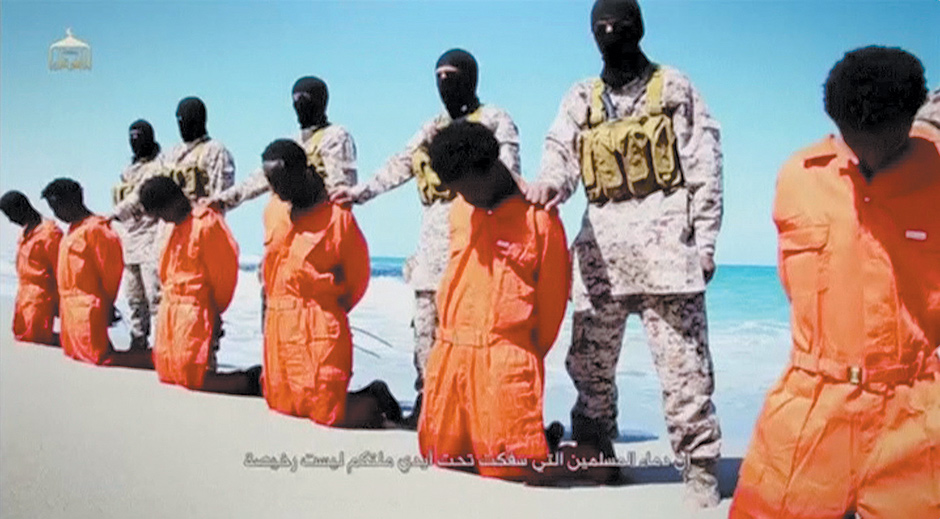 A still from a video released by ISIS on April 19, which appears to show the execution of Ethiopian Christians by members of Wilayat Barqa, an affiliate of ISIS in eastern Libya