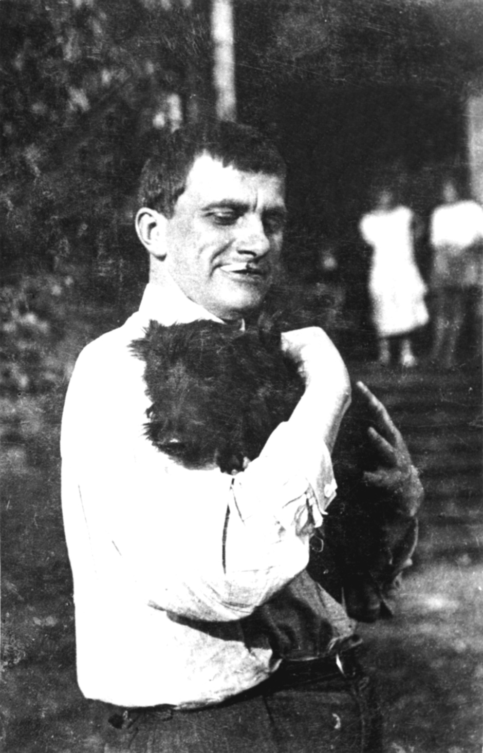 Vladimir Mayakovsky with Scotty, a dog bought by Lili Brik in England, at the Briks’ dacha in Pushkino, summer 1924