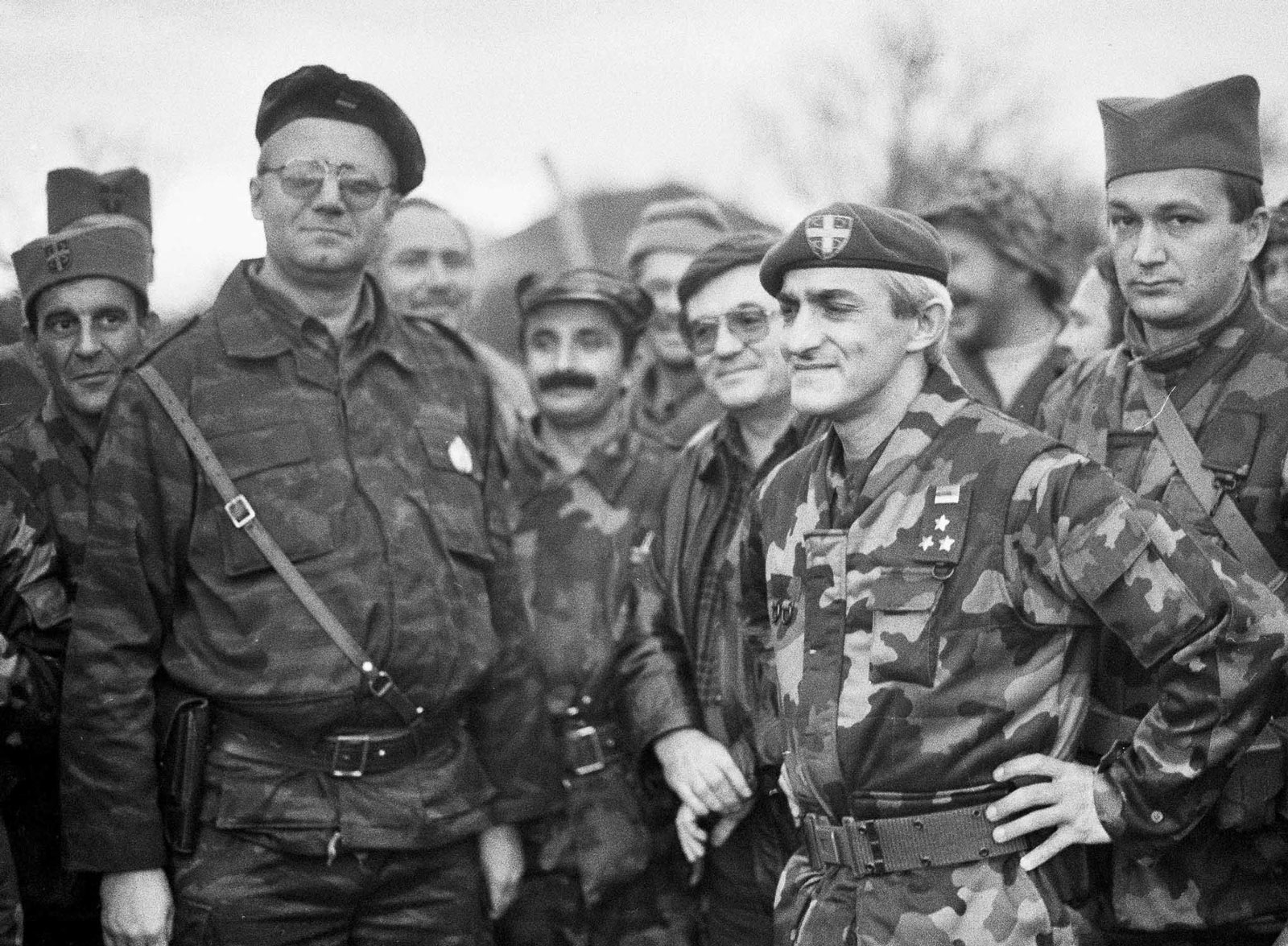 Serbian ultra-nationalist leader Vojislav Šešelj (left), with paramilitary leader Dragan Vasiljković (“Captain Dragan”) and other Serbian fighters, Croatia, circa 1991