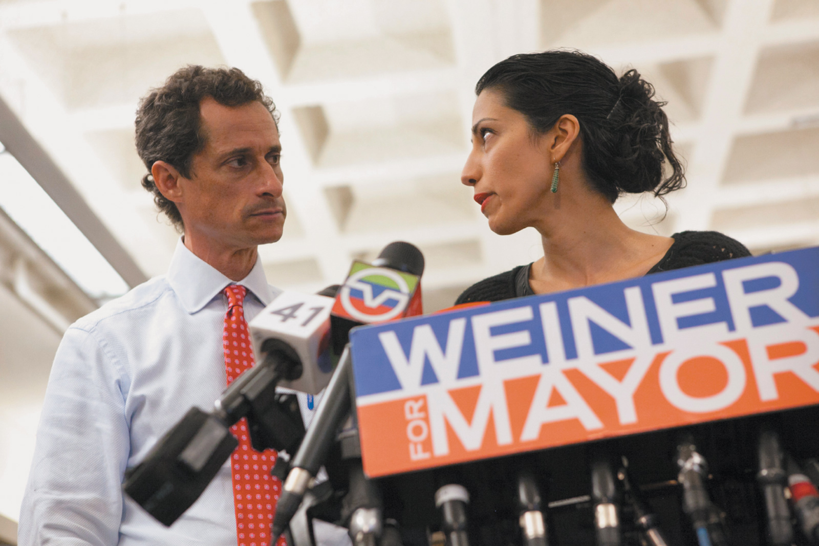 Anthony Weiner and Huma Abedin at the press conference announcing his intention to stay in New York’s mayoral race despite new revelations about his explicit text messages to women sent after a similar scandal in 2011 that had forced him to resign from Congress, New York City, July 23, 2013