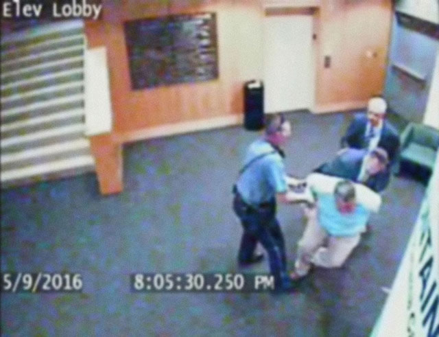 Video footage of library staff member Steve Woolfolk being arrested
