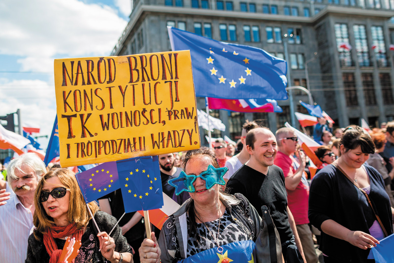 Pro-EU protesters at a demonstration against Poland’s right-wing government, Warsaw, May 2016. The sign says, ‘The people defend the Constitution as well as freedom, laws, and the threefold form of government.’