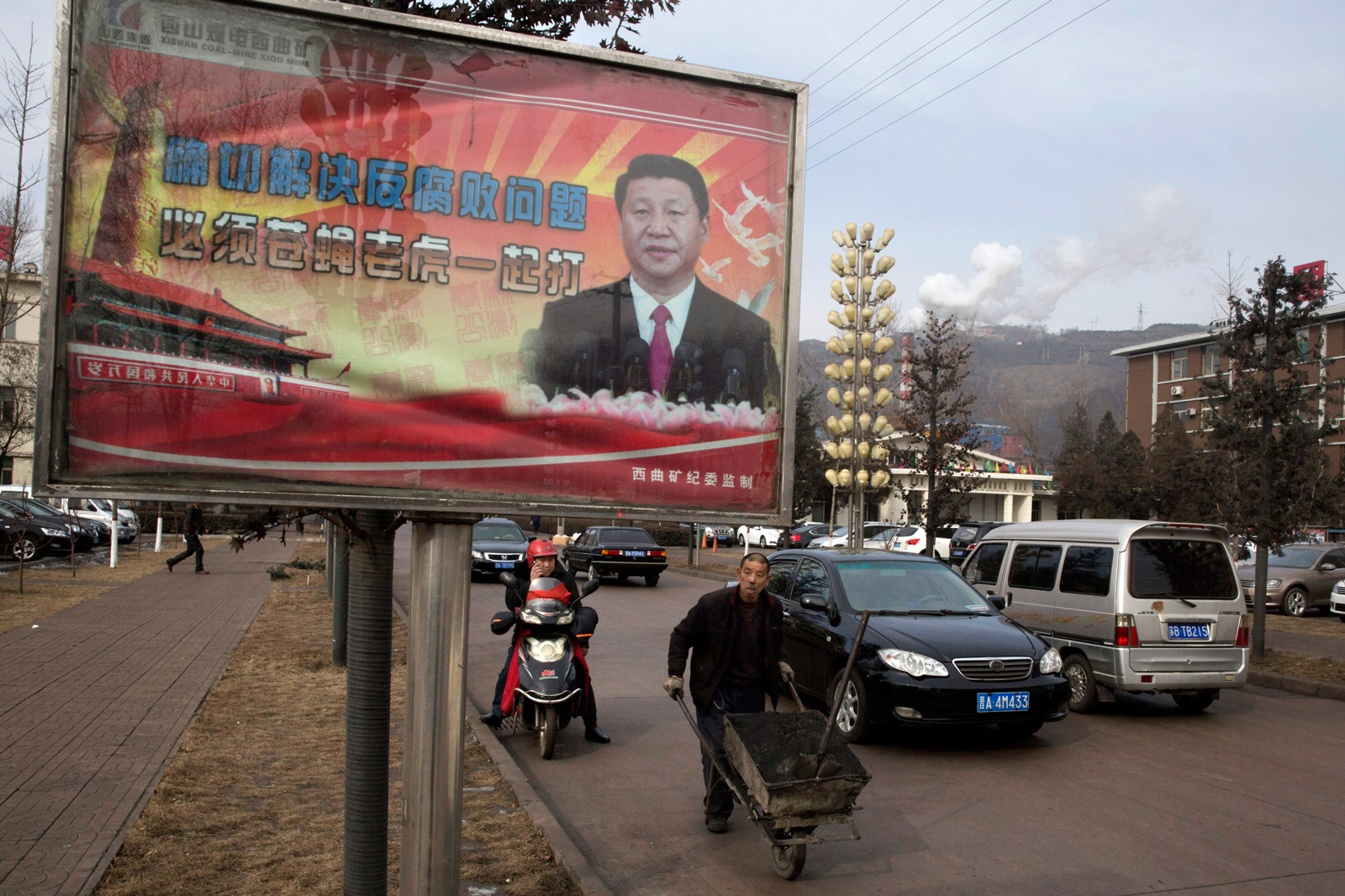 A billboard showing Chinese President Xi Jinping with the slogan, 