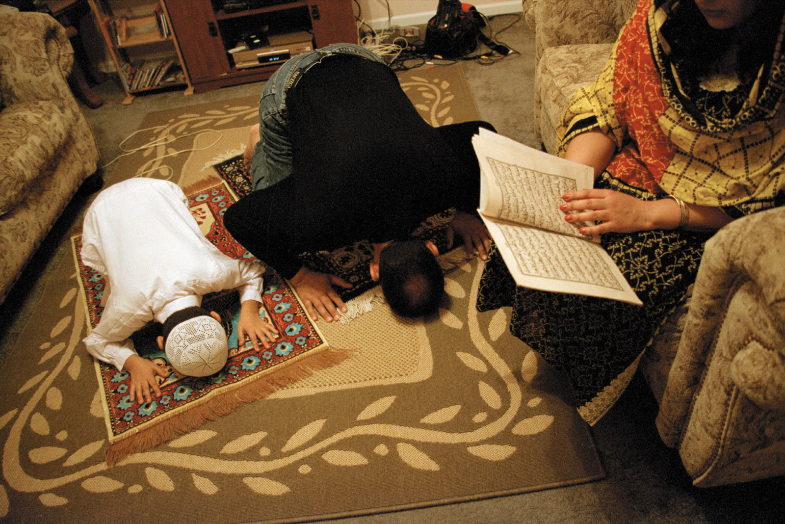 A Muslim family praying, Rockwood, Minnesota, 2003