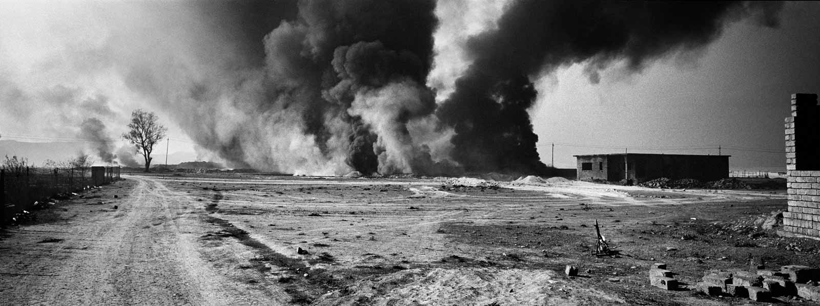 Smoke from fires at the oil fields around Qayyarah, a city southeast of Mosul, set alight by ISIS fighters in an effort to prevent coalition airstrikes, 2016