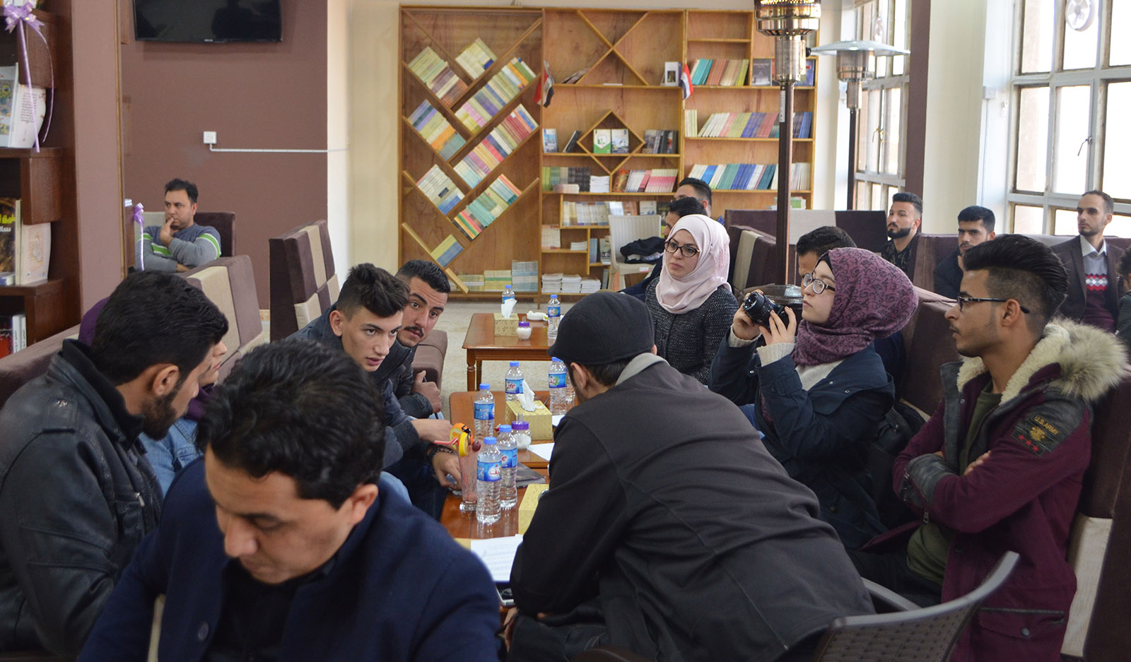 Mosul residents meeting at the Book Forum café, January 6, 2018