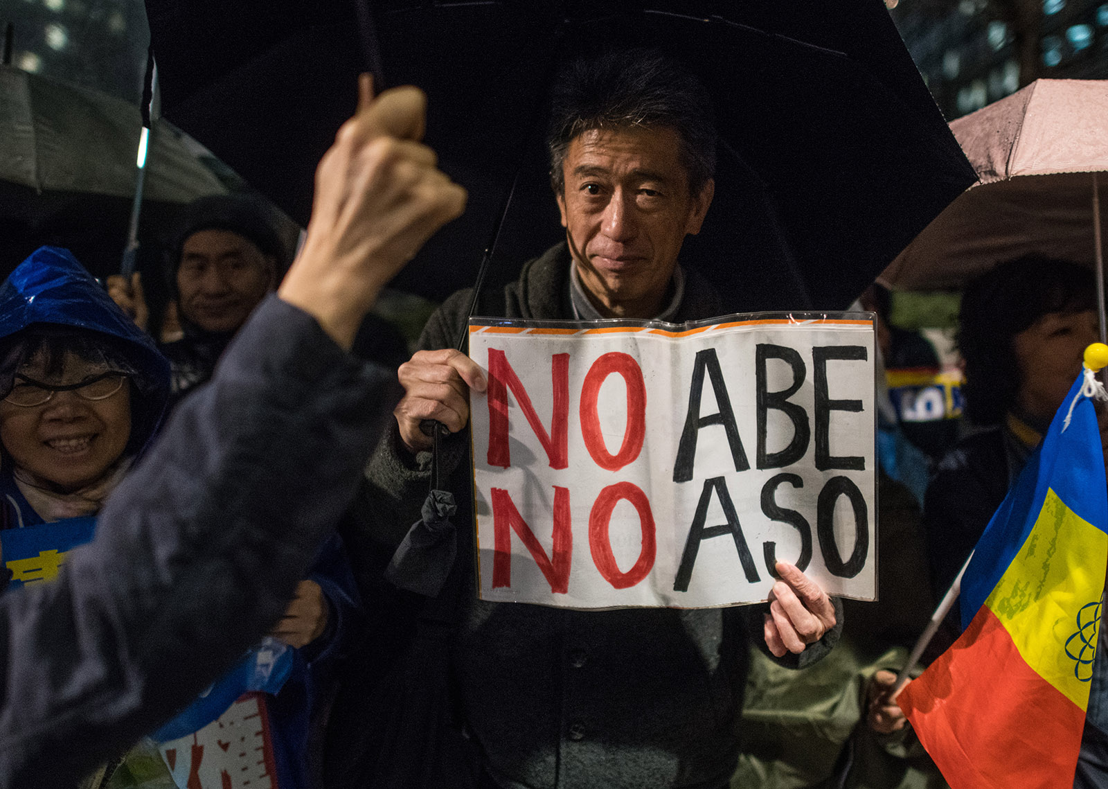 Protesters calling for the resignation of Prime Minister Shinzo Abe and his finance minister, Taro Aso, over a land sale scandal, Tokyo, Japan, March 16, 2018