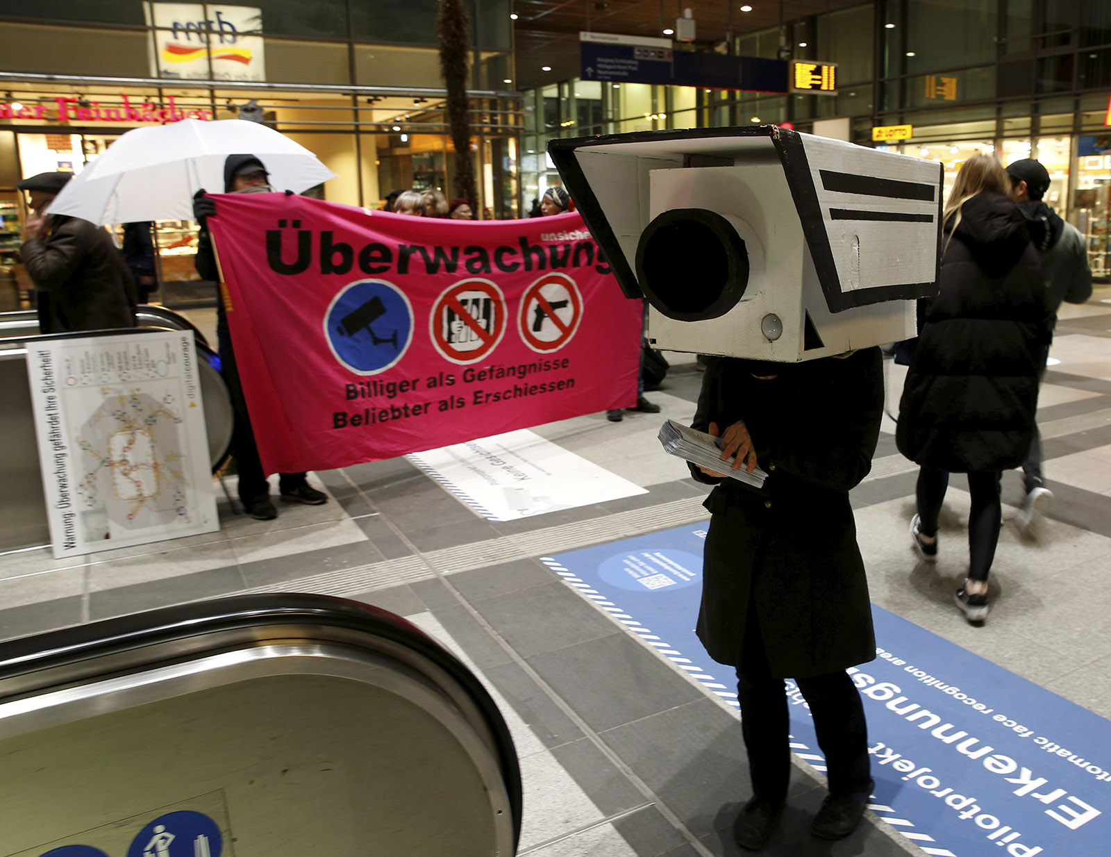 A demonstrator dressed as a security camera at an anti-surveillance protest, Berlin, November 2017