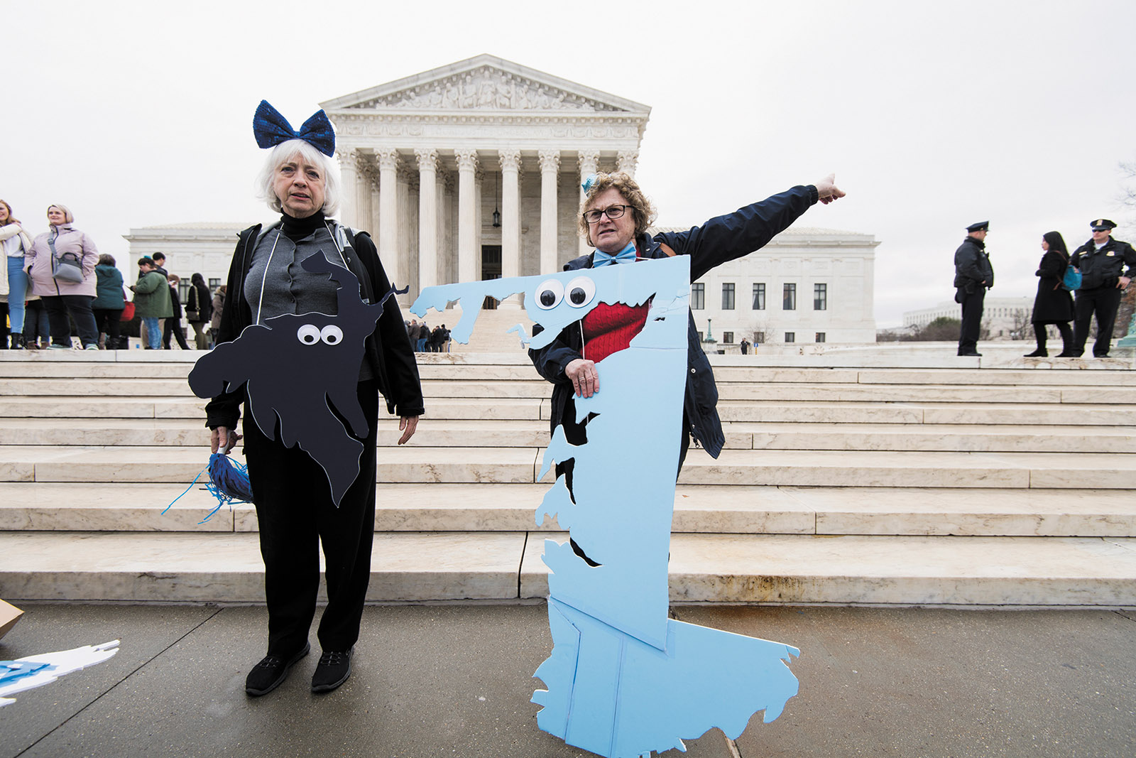 Anti-gerrymandering activists in costume as Maryland district 5 (left) and district 1 (right) in front of the Supreme Court, March 2018