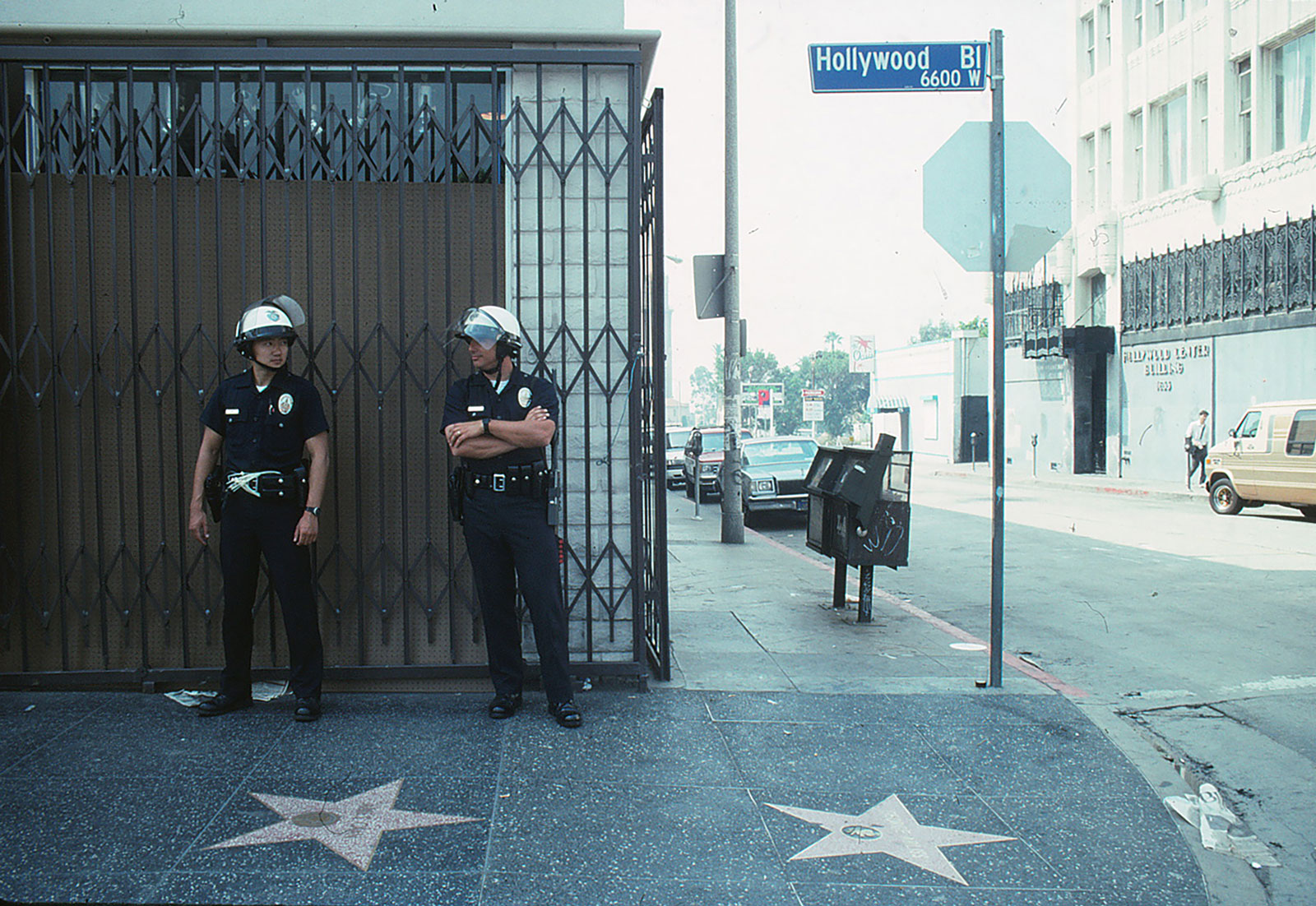 Two LAPD officers the morning after rioting reached Hollywood Boulevard following the acquittals of some of the LAPD officers who violently beat Rodney King the year before, Los Angeles, 1992