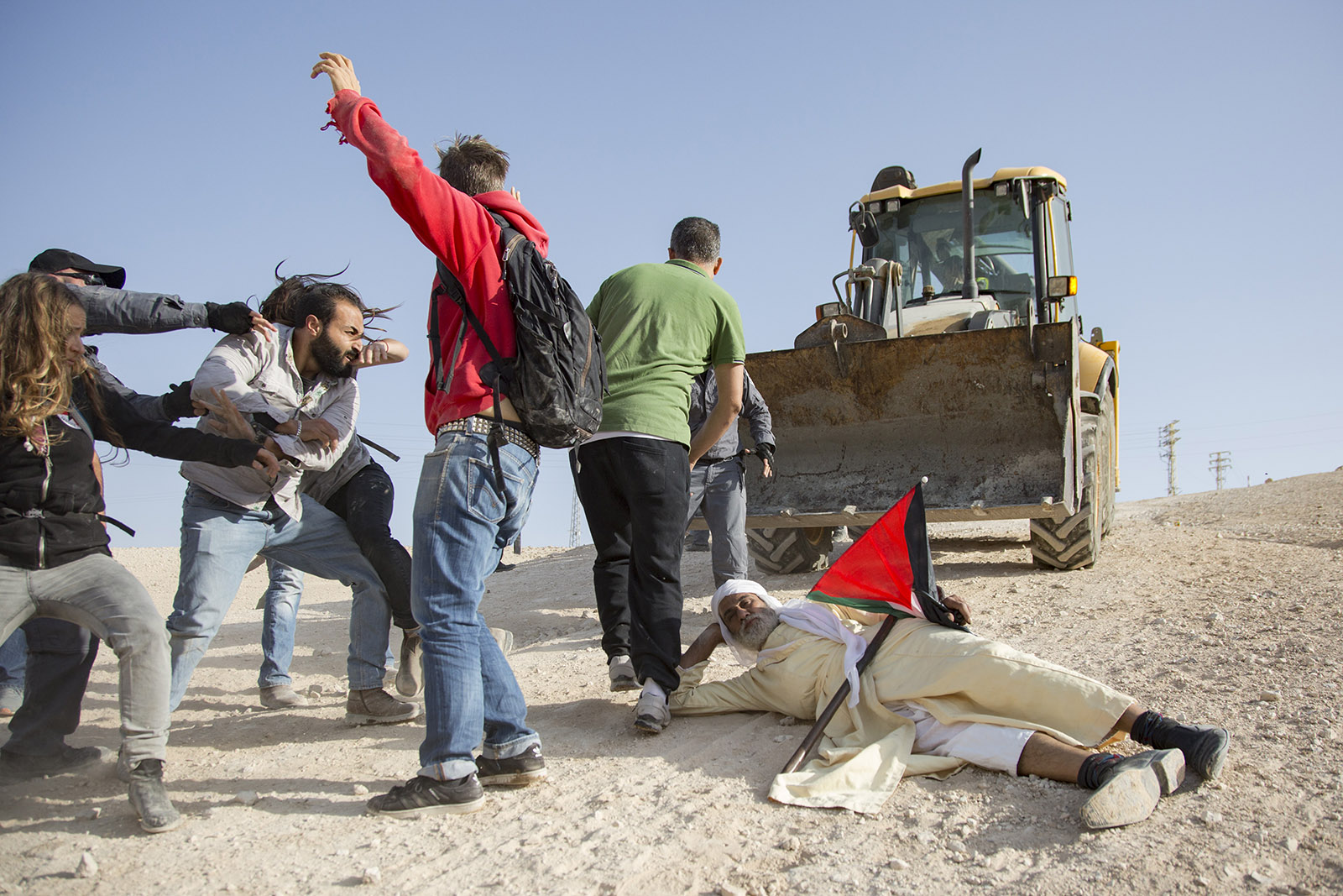 Villagers and activists facing arrest for protesting the attempted demolition of Bedouin Palestinian dwellings at al-Khan al-Ahmar, West Bank, October 15, 2018