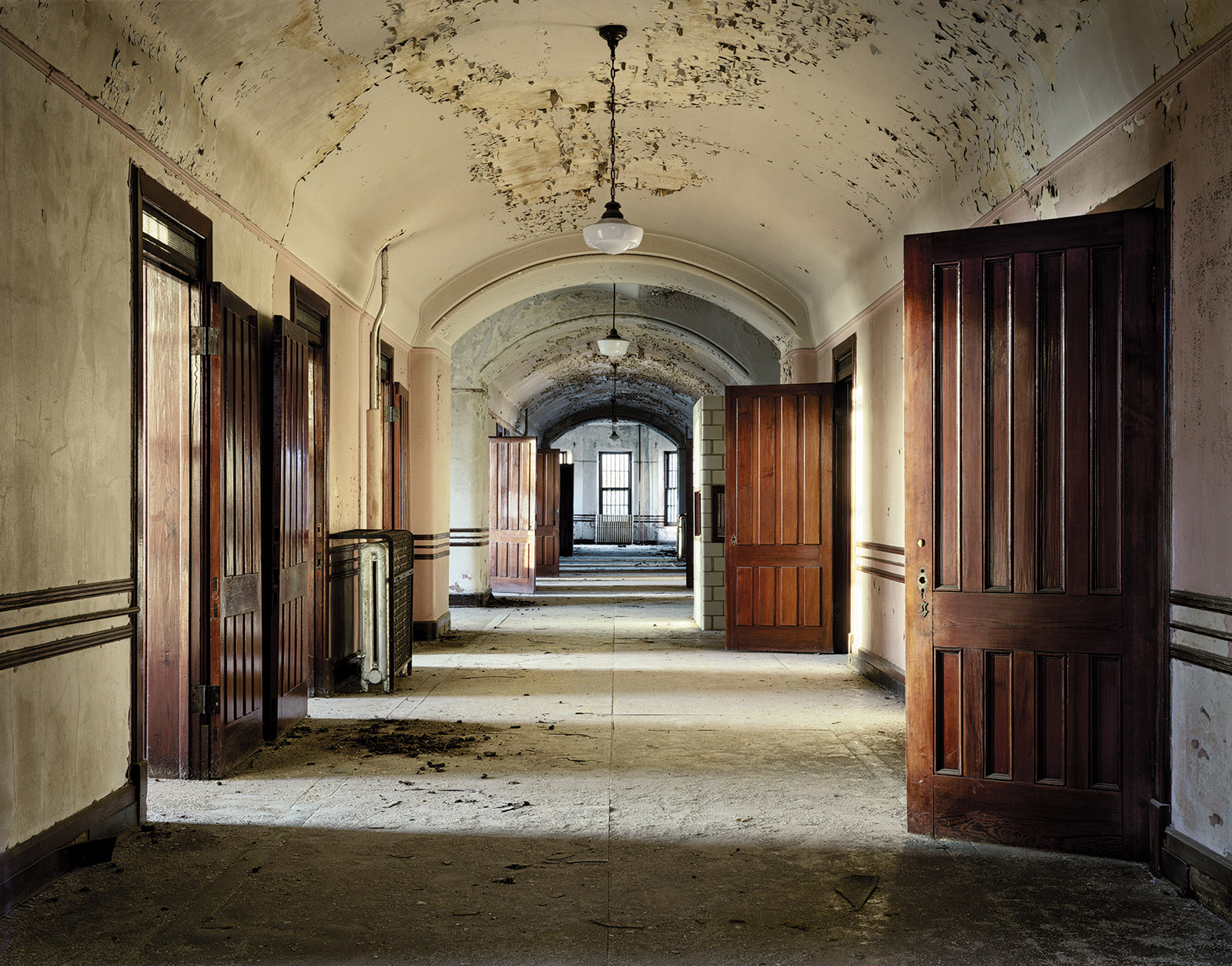 An abandoned ward at Kankakee State Hospital, Illinois; photograph by Christopher Payne from his book Asylum: Inside the Closed World of State Mental Hospitals, 2009