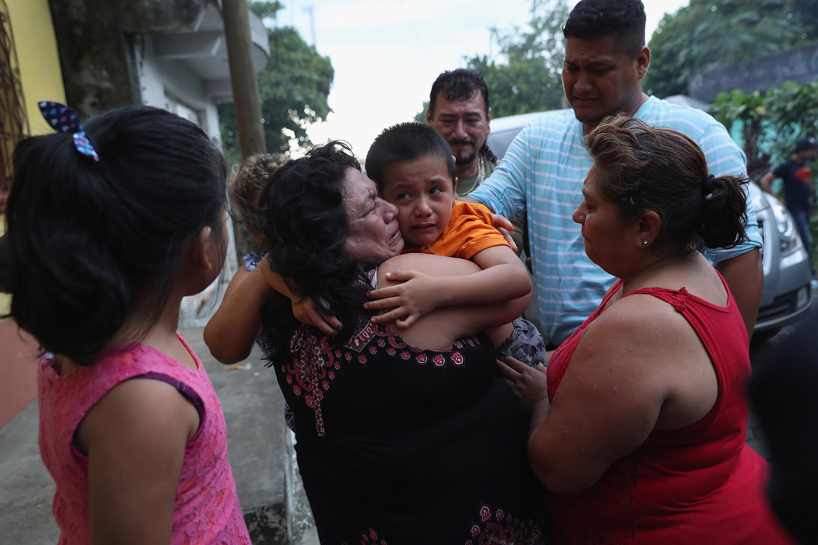 Family members welcoming home six-year-old Leo Jeancarlo de Leon, who had been separated from his mother, Lourdes de Leon, for nearly three months after they were detained by Border Patrol in the US, San Marco, Guatemala, August 8, 2018