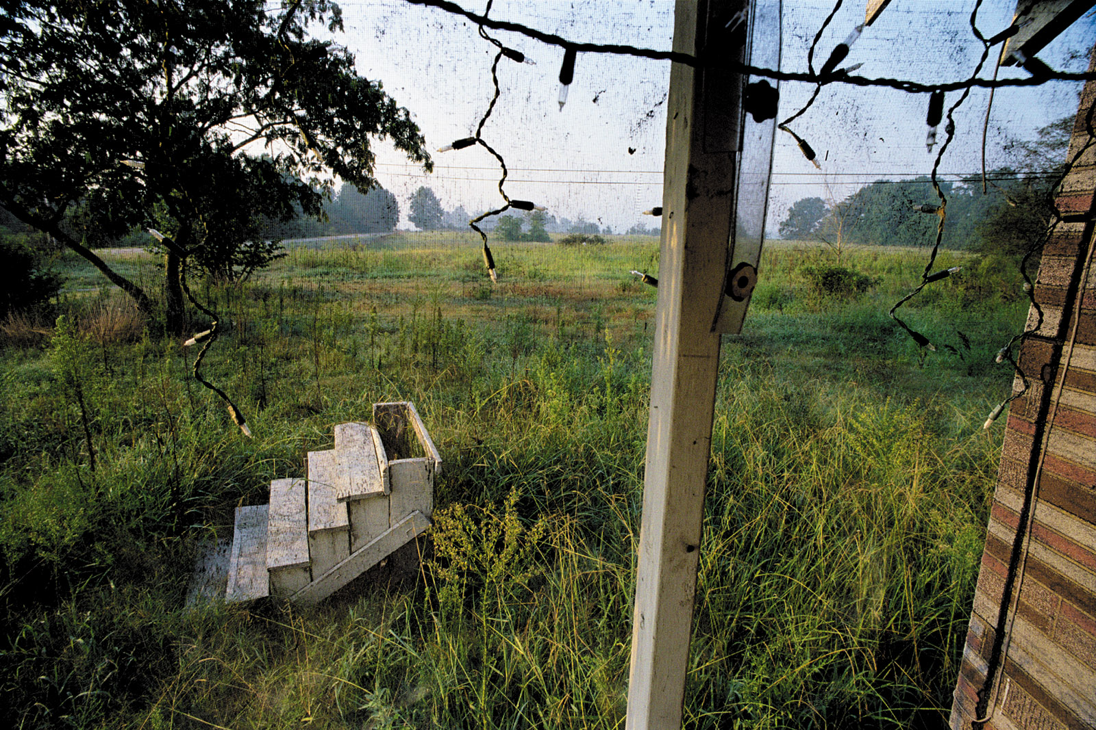 An abandoned farmhouse, 2005; photograph by Eugene Richards from The Run-On of Time, the catalog of a recent exhibition that originated at the George Eastman Museum and the Nelson-Atkins Museum of Art. It is distributed by Yale University Press.