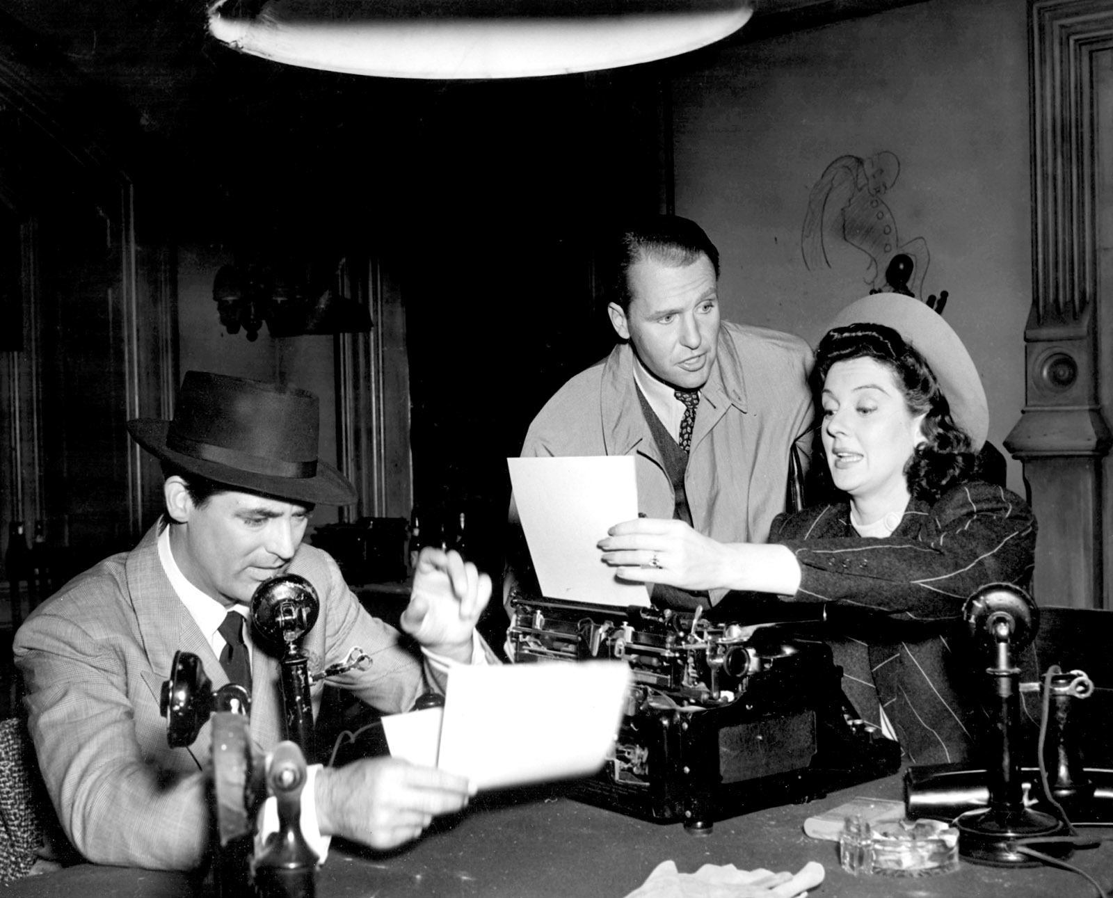 Cary Grant, Ralph Bellamy, and Rosalind Russell in His Girl Friday, 1940