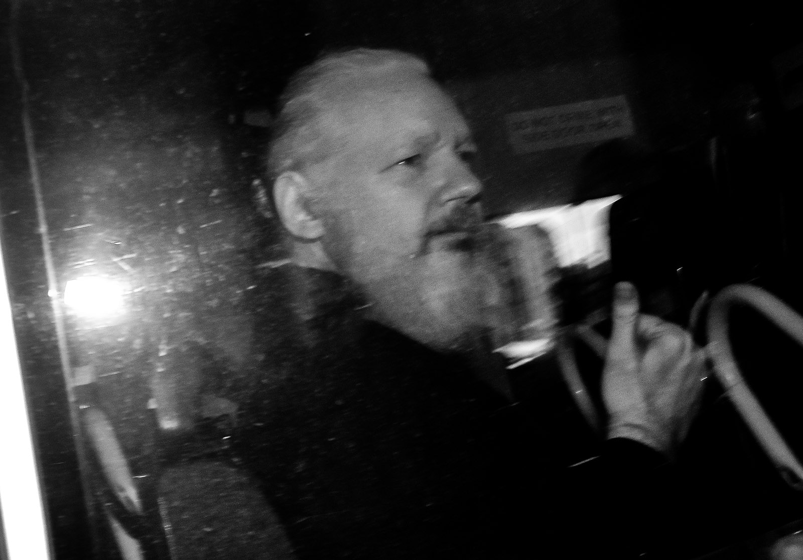 Julian Assange on his way to court following his arrest at the Ecuadorian Embassy, London, England, April 11, 2019