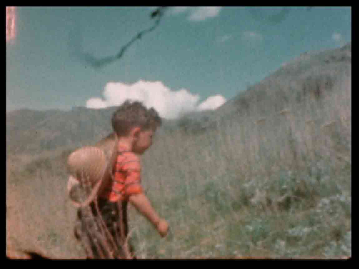 A still showing the author as a boy, from the 8mm films of Dr. Ernst Lyon, made in Perry, Utah, 1944–1945