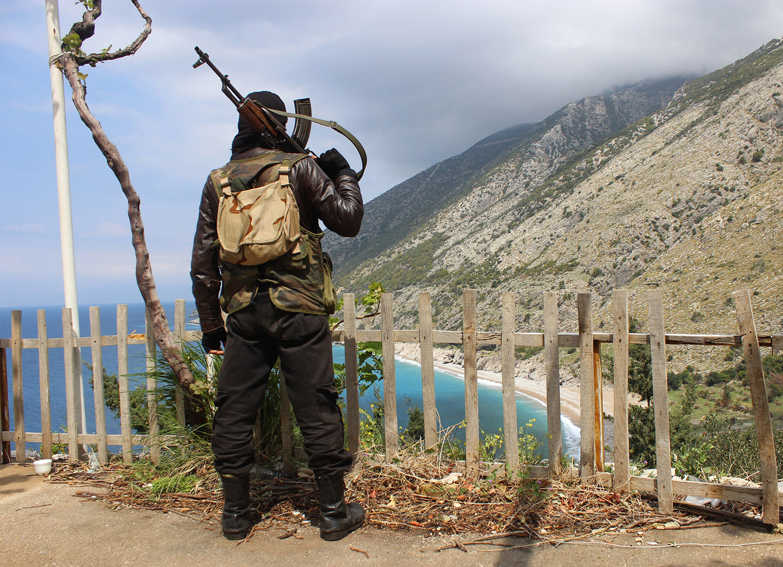 A fighter from the Ansar al-Sham brigade standing on a ridge in the northwestern Syrian province of Latakia during a rebel offensive against regime positions in the coastal heartland of President Bashar al-Assad’s Alawi sect, 2014