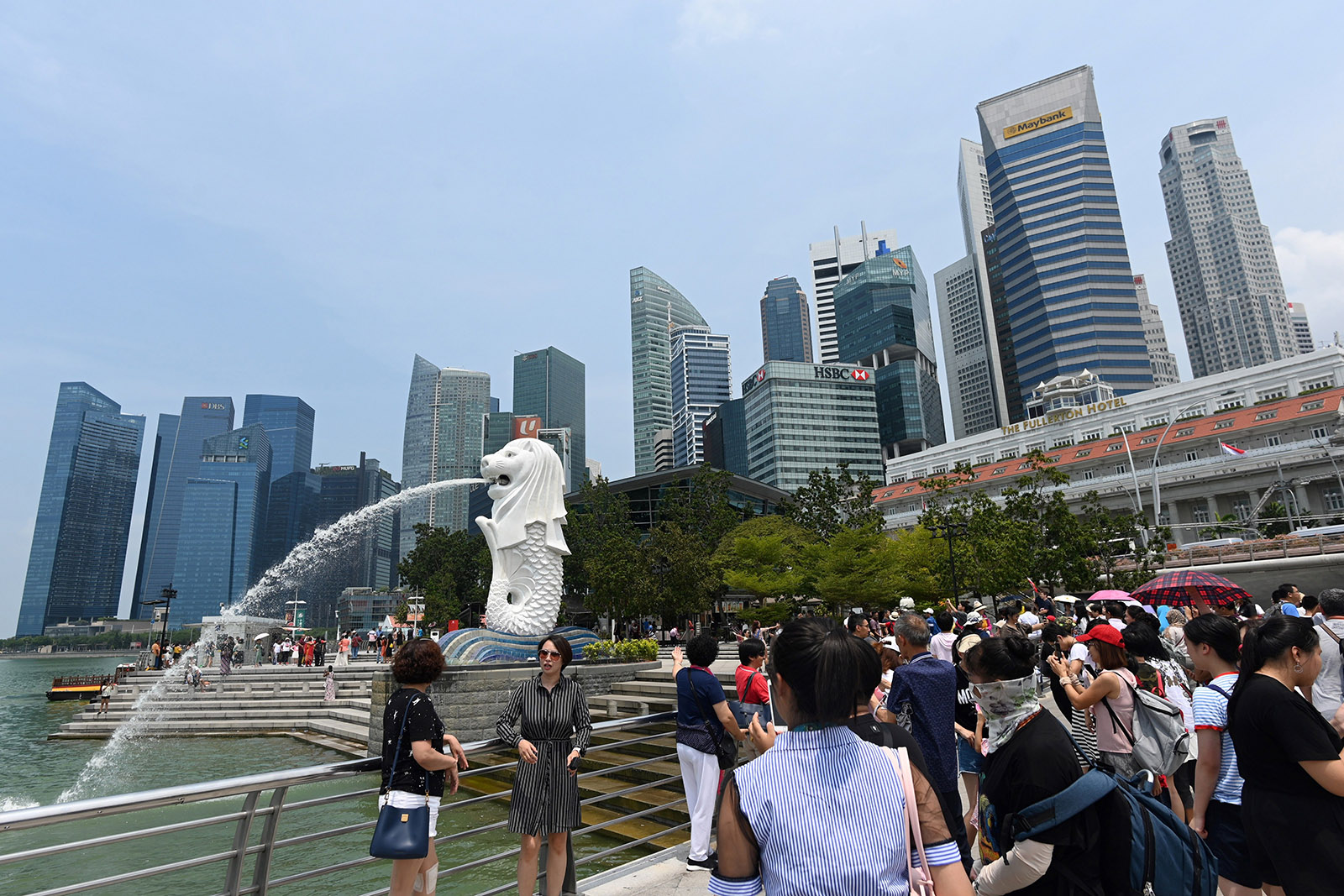 Visitors at the Merlion park, Singapore, August 13, 2019