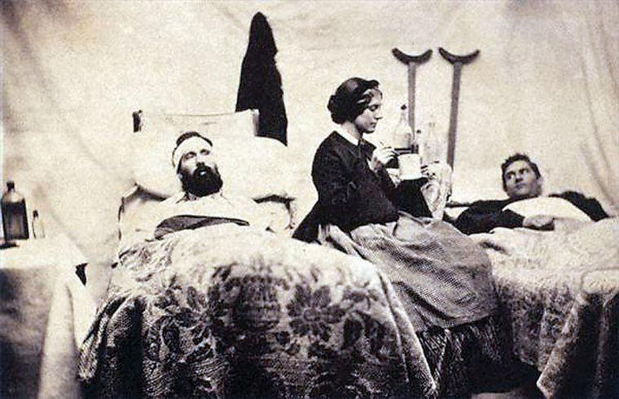 Wounded soldiers resting with a nurse, Civil War, circa 1864