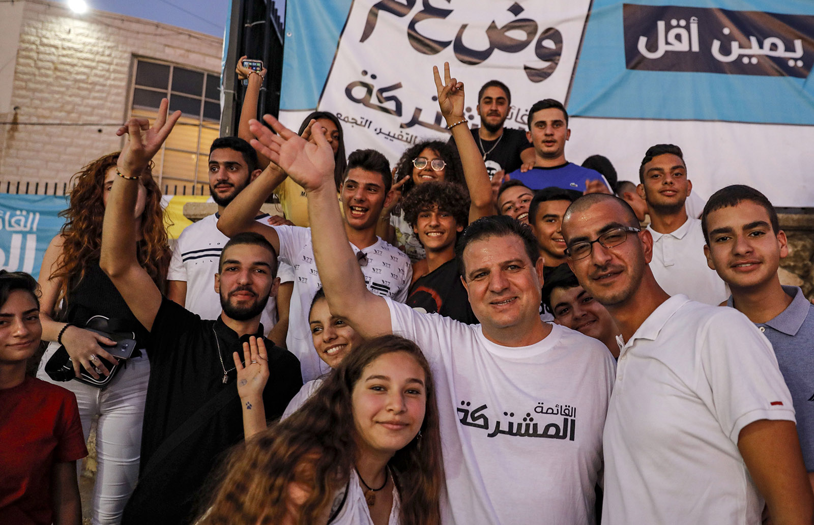 The Israeli-Arab politician Ayman Odeh (front, third from right) at a campaign rally for the Joint List alliance of Arab parties ahead of Israel’s September election, Kafr Yasif, Israel, August 23, 2019