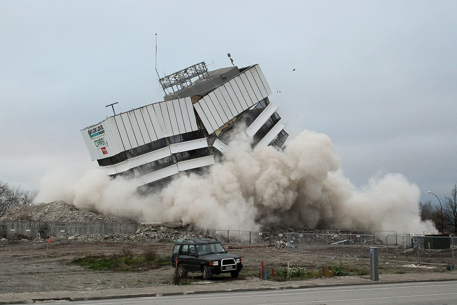 Earthquake Damaged Building Blown Up In Controlled Demolition
