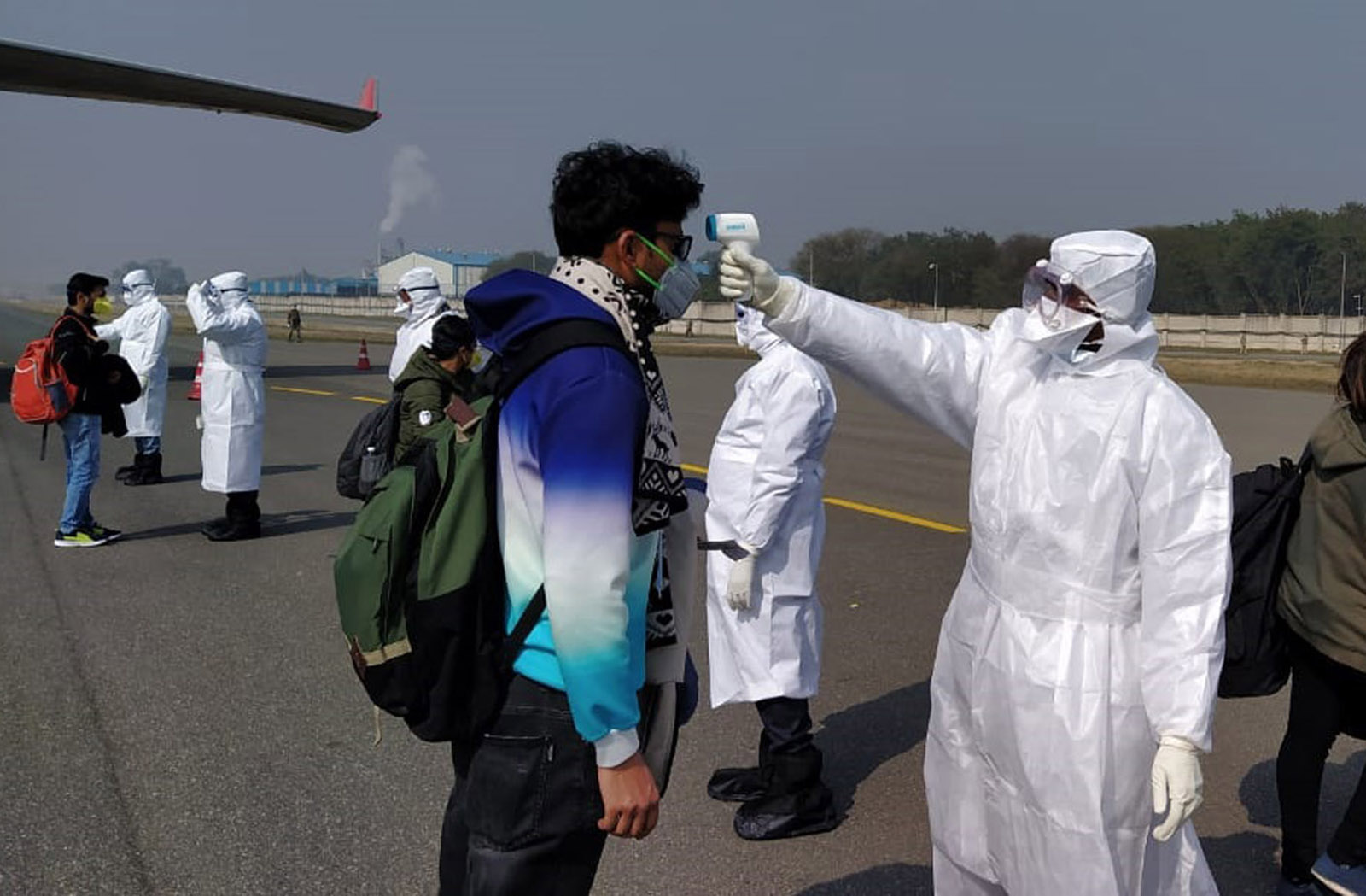 Indian passengers being screened for coronavirus at New Delhi airport