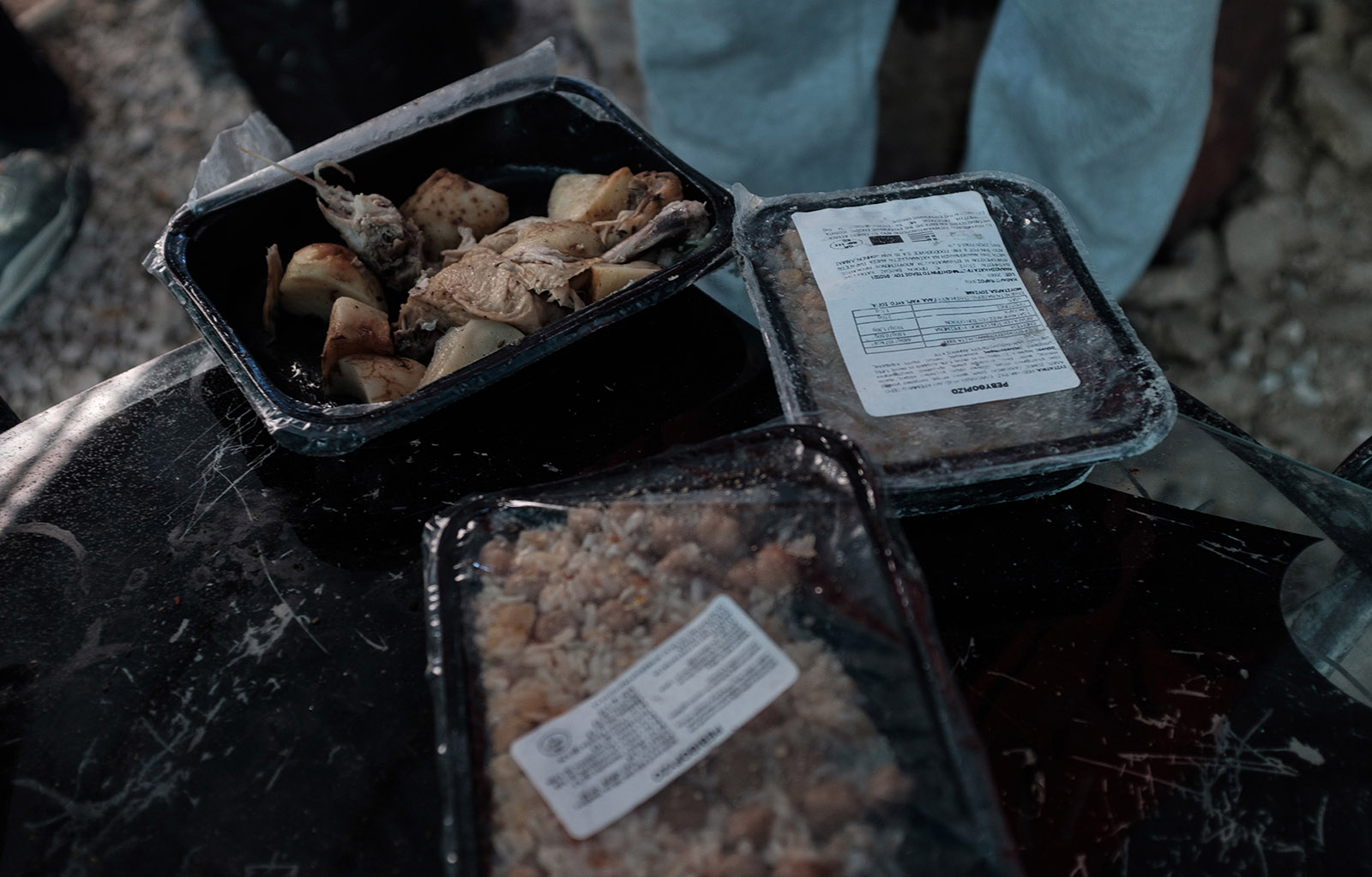 Prepackaged meals discarded in Vial refugee camp