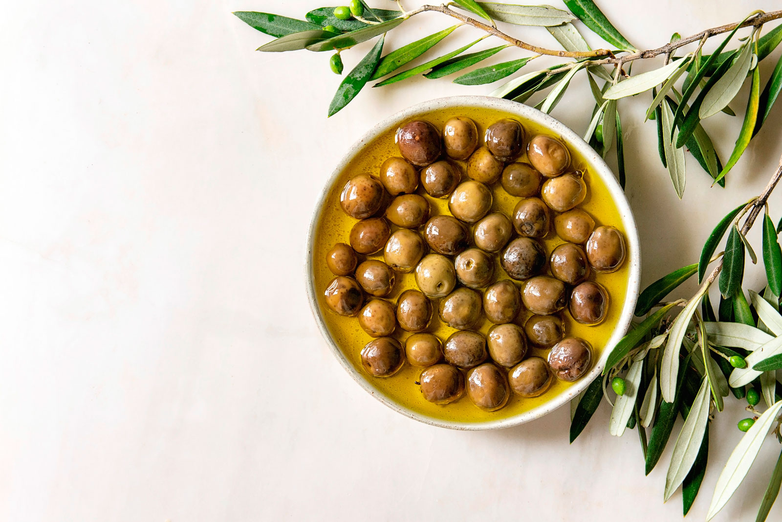 A bowl of green olives 