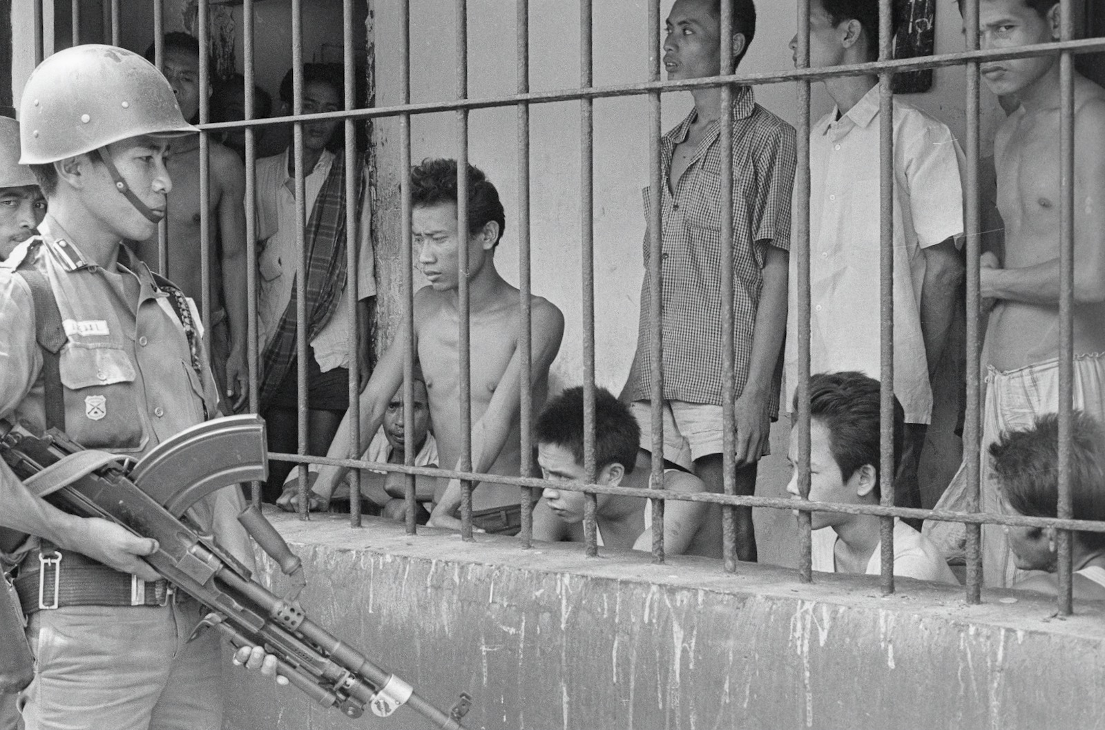 Suspected communists under armed guard, Jakarta, Indonesia, December 1, 1965