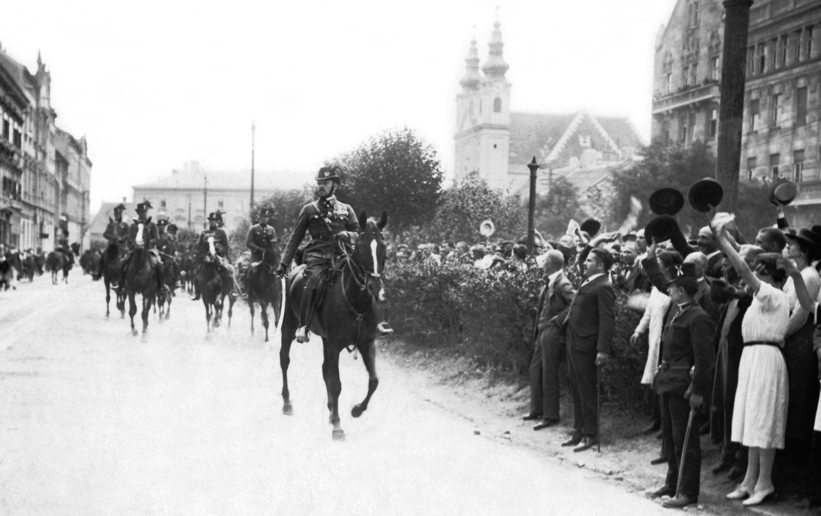 Mounted gendarmes moving through the city of Sopron in support of West-Hungarians protesting the Trianon Treaty that would turn over the territory to Austria, Hungary, 1921