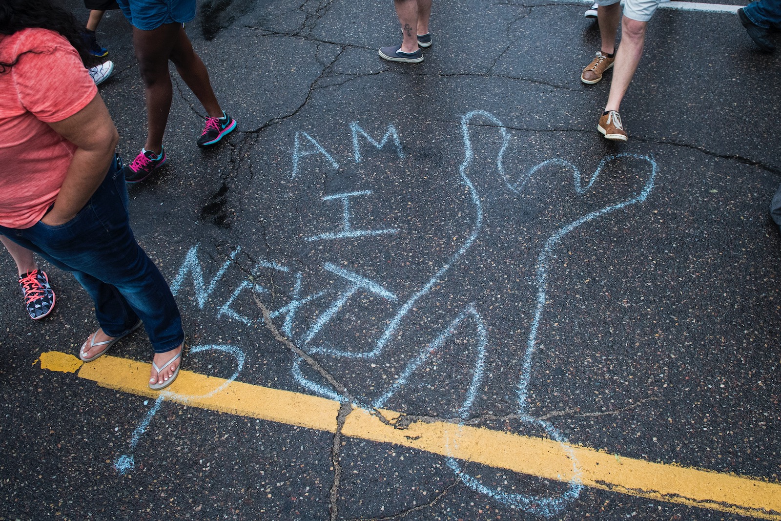 A message chalked on the road during a demonstration protesting the police shooting death of Philando Castile after a traffic stop, St. Paul, Minnesota, July 7, 2016
