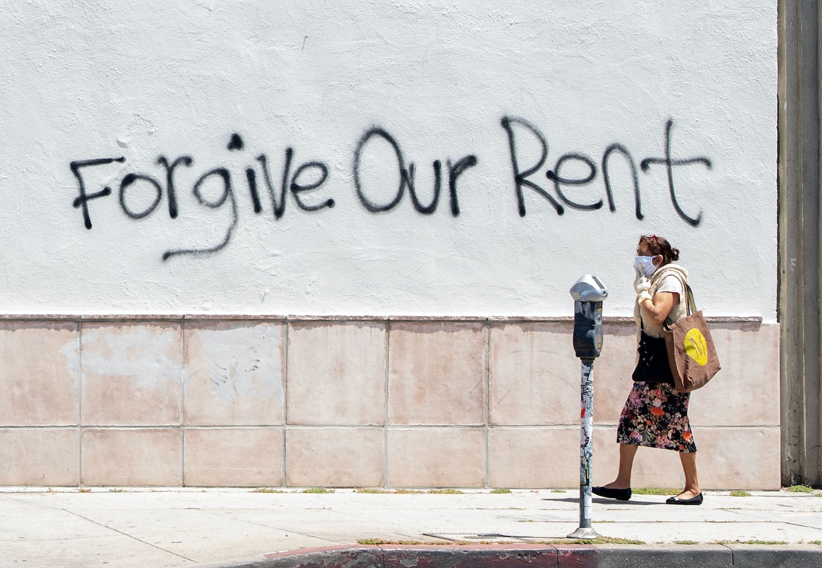 Rent forgiveness graffiti on La Brea Avenue, Los Angeles