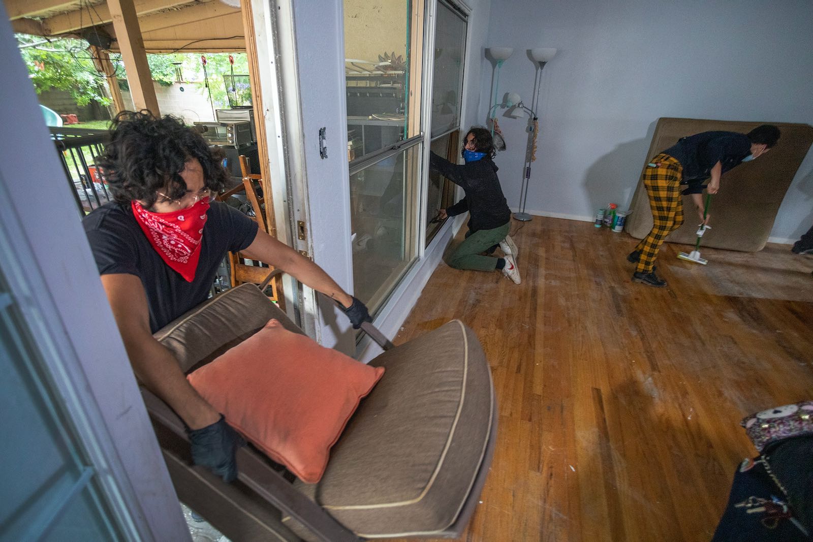 Housing activists breaking in to a boarded up home