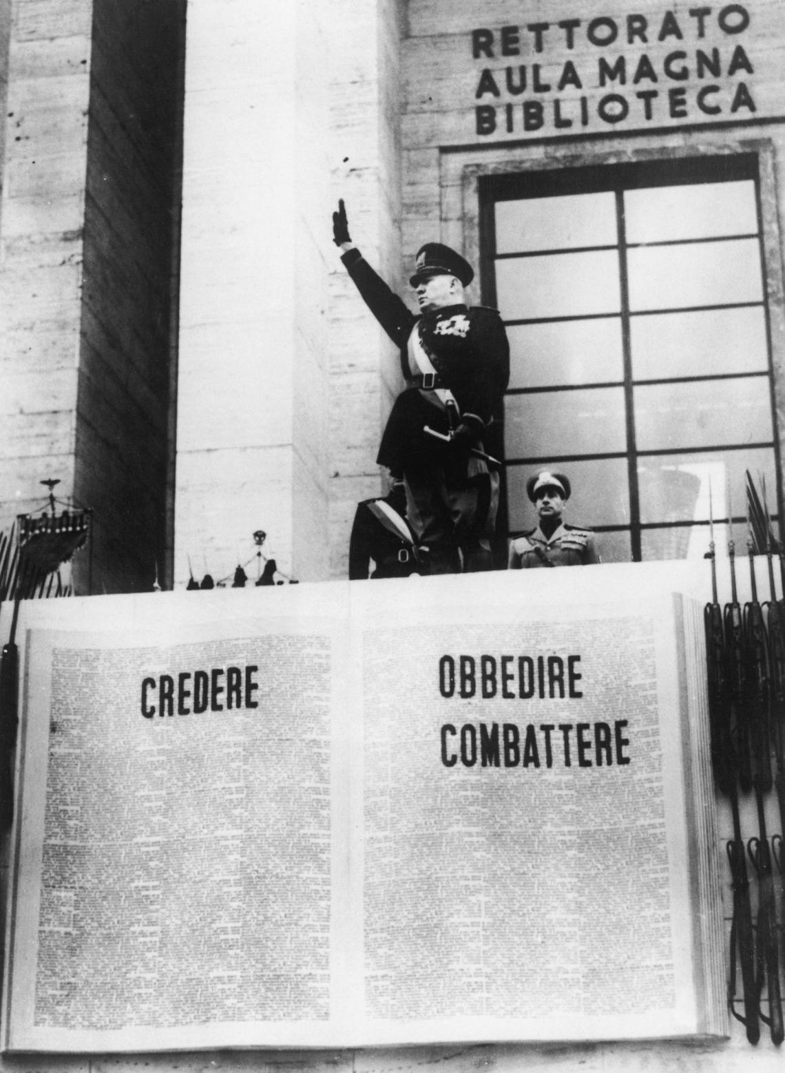 Benito Mussolini saluting