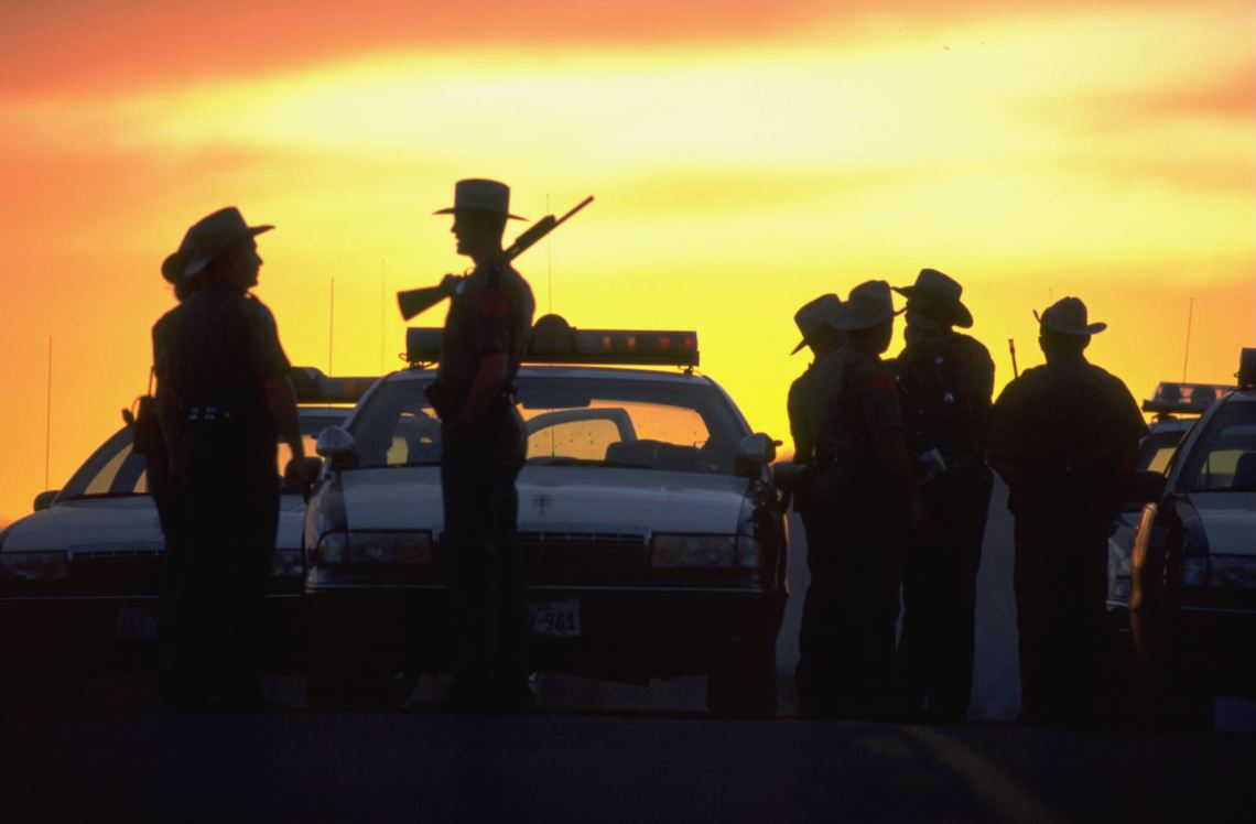 State troopers guarding a roadblock