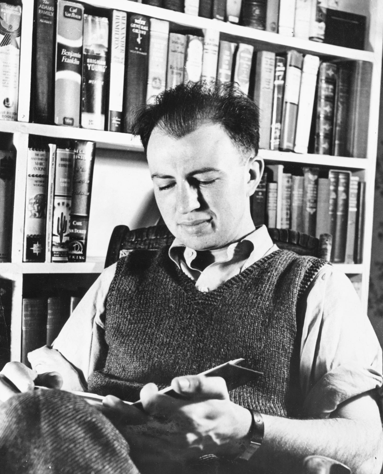 Howard Fast in his library, 1943